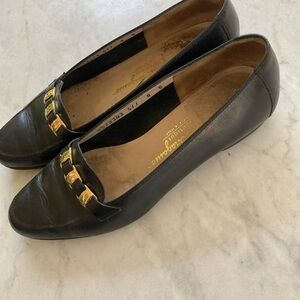 Salvatore Ferragamo Black Flats with Gold Accents